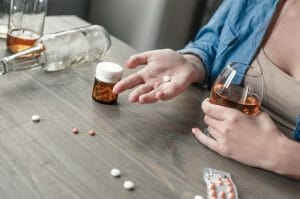 The Ultimate Guide to Choosing the right Hemp or CBD Tea 7 person with pills and alcohol